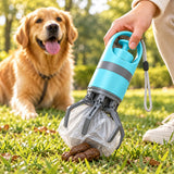 Blue portable dog pooper scooper with six-claw pickup mechanism and waste bag shown collecting dog waste during an outdoor walk